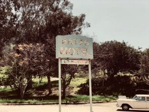 Bates Motel signage near tree