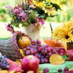 Flowers and Fruits on a Table