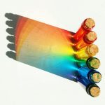 six assorted paint color tubes